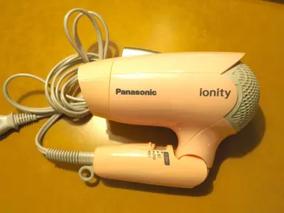 a hair dryer is hooked up to a cord at Smile Hotel Tokyo Shinkoiwa - Vacation STAY 33618v in Tokyo