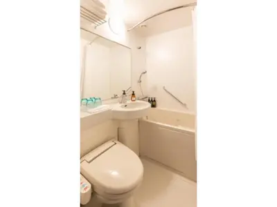 a bathroom with a toilet and a sink and a tub at Far East Village Hotel Tokyo Ariake - Vacation STAY 31697v in Tokyo