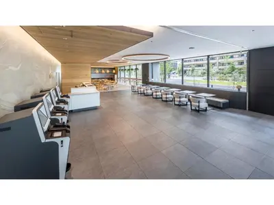 a large lobby with chairs and desks in a building at Far East Village Hotel Tokyo Ariake - Vacation STAY 31683v in Tokyo