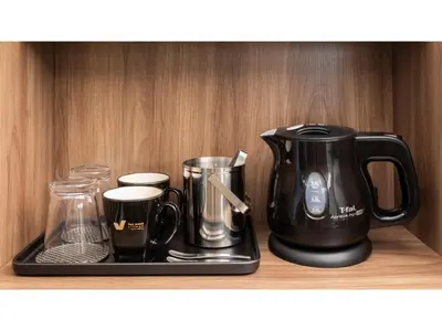 a black coffee maker on a tray on a shelf at Far East Village Hotel Tokyo Ariake - Vacation STAY 31648v in Tokyo