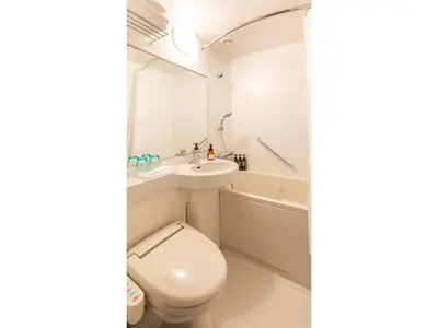 a bathroom with a toilet and a sink and a tub at Far East Village Hotel Tokyo Ariake - Vacation STAY 31648v in Tokyo