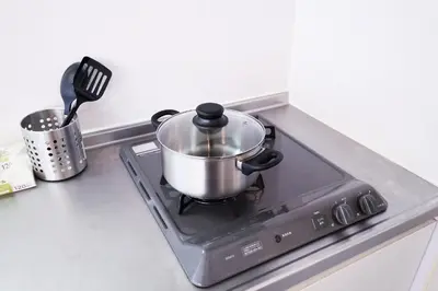 a pot sitting on top of a stove at Belshaart Kamikitazawa - Vacation STAY 20138 in Tokyo