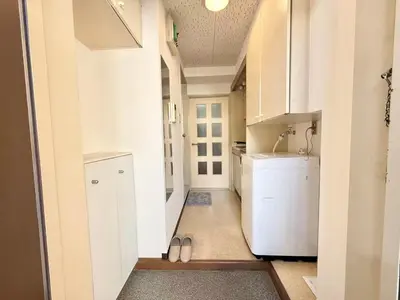 a small kitchen with a sink and a refrigerator at Ikebukuro Sugamo\u99c5\u8fd1B4 in Tokyo