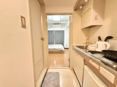 a kitchen with a sink and a counter top at Ikebukuro Sugamo\u99c5\u8fd1B4 in Tokyo