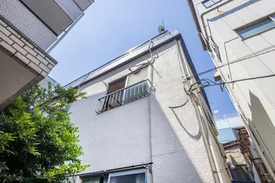 a window on the side of a building at 7 min to JR Otsuka,Direct Yamanote Line ,1 stop to Ikebukuro,Direct to Shinjuku ,Shibuya,Fully Renovated,18 sqm,2 Guests #102 in Tokyo