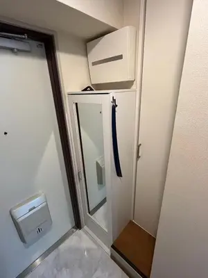 a small bathroom with a shower and a mirror at Sweet house 5 minutes walk from Shibuya station Dogenzaka apartment in Tokyo