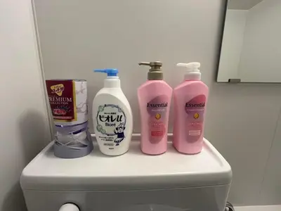 a group of three bottles on top of a toilet at Sweet house 5 minutes walk from Shibuya station Dogenzaka apartment in Tokyo