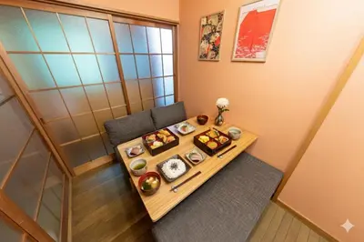 a room with a table with sushi on it at Matsubara Station 2 minutes Shinjuku, Shibuya 15 minutes Pure Japanese style house where you can feel the seasons Maximum 6 people rent a house Quiet house in Tokyo