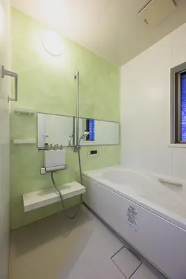 a bathroom with a bath tub and a sink at Skytree View Rooftop Villa Asakusa SVRVA in Tokyo