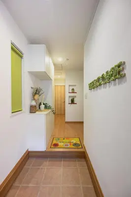 a hallway of a house with a rug on the floor at Skytree View Rooftop Villa Asakusa SVRVA in Tokyo