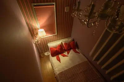 a bed with red bows on it in a room at Skytree View Rooftop Villa Asakusa SVRVA in Tokyo