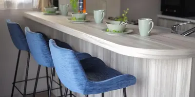 a counter with blue chairs and cups on it at CLASS Shinagawa in Tokyo