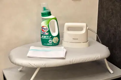 a bottle of detergent sitting on top of a chair at \u3068\u307e\u308a\u30fc\u3068Stay\u65b0\u5bbf Tomareat Stay Shinjuku in Tokyo