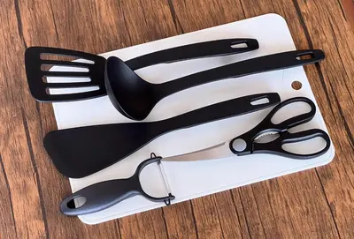 a white plate with black utensils on a table at \u30ec\u30b8\u30c7\u30f3\u30b7\u30e3\u30eb\u30b9\u30c6\u30fc\u30b81107 in Tokyo