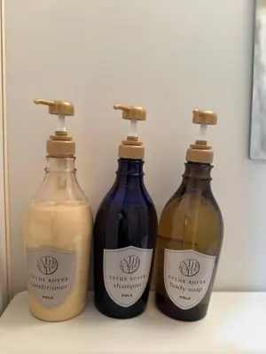 three bottles of wine sitting on a shelf at Shinjuku JX-101 SJ0283 in Tokyo