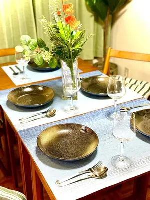 a table with plates and wine glasses on it at \u99c5\u5f92\u6b6910\u5206\u30c7\u30a3\u30ba\u30cb\u30fc25\u5206\u30b9\u30ab\u30a4\u30c4\u30ea\u30fc\u6d45\u834930\u5206\u8cb8\u5207\u4e00\u68df\u6700\u59275\u540d\u5927\u578b\u30b7\u30e7\u30c3\u30d4\u30f3\u30b0\u30e2\u30fc\u30eb1\u5206 in Tokyo