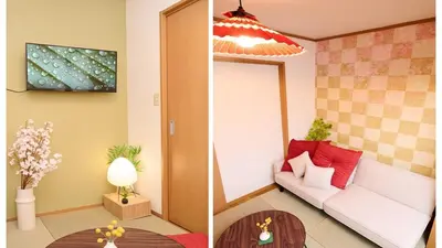 a living room with a couch and a table at 1Transfer at Shibuya 5min Walk from Shin-Koiwa Stn Direct Narita Easy Access Disney CVS 30s \u6e0b\u8c37\u4e57\u63db1\u56de\u99c5 \u5f92\u6b695\u5206 \u30b3\u30f3\u30d3\u30cb\u5f92\u6b6930\u79d2 \u6210\u7530\u7a7a\u6e2f\u307e\u3067\u76f4\u901a \u30c7\u30a3\u30ba\u30cb\u30fc\u30ea\u30be\u30fc\u30c8\u307e\u3067\u30a2\u30af\u30bb\u30b9\u629c\u7fa4 in Tokyo
