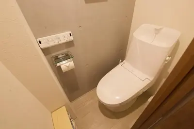 a bathroom with a white toilet in a room at Heureux Shiinamachi 201 in Tokyo