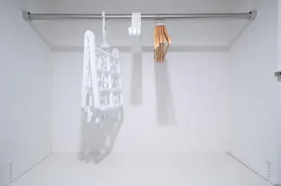 a room with white walls and a white towel rack at monthly PRIME asakusa in Tokyo