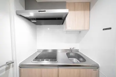a kitchen with a sink and a stove at monthly PRIME asakusa in Tokyo