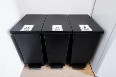 four black boxes stacked on top of each other at monthly PRIME asakusa in Tokyo