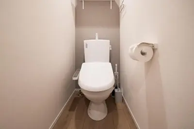 a bathroom with a toilet and a roll of toilet paper at monthly PRIME asakusa in Tokyo