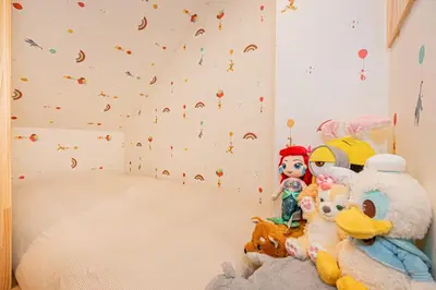 a room with stuffed animals sitting on a bed at 120sqm 5LDK 3-Stories House 3BT JR Shin-Okubo 5min in Tokyo