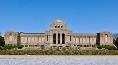 a large stone building with a blue sky in the background at Rtt\u5357\u5143\u753a12 in Tokyo