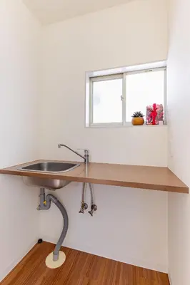 a kitchen counter with a sink and a window at Rtt\u5357\u5143\u753a12 in Tokyo