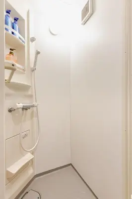 a small white refrigerator with a glass door at Rtt\u5357\u5143\u753a12 in Tokyo