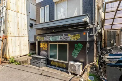 a store front of a building on a street at Rtt\u5357\u5143\u753a12 in Tokyo