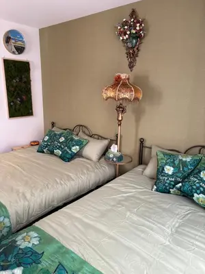 two beds sitting next to each other in a room at \u5730\u4e0b\u9244\u99c5\u5f92\u6b695\u5206 \u30c7\u30a3\u30ba\u30cb\u30fcDisney\u30d0\u30b9 \u7fbd\u7530\u7a7a\u6e2f \u30ea\u30e0\u30b8\u30f3\u30d0\u30b9 \u7bc9\u6d45 \u6c34\u5727\u826f JAPAN STAY Pearl in Tokyo