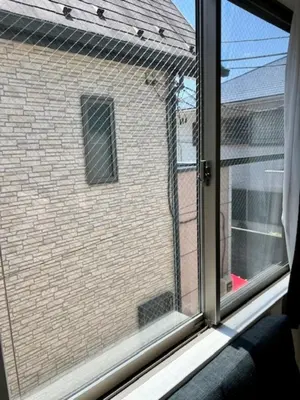 a window with a view of a brick building at Gracious Higashishinjuku - Vacation STAY 35525v in Tokyo