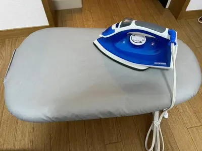 a iron is sitting on top of a couch at Fuji Flats - Vacation STAY 35595v in Tokyo