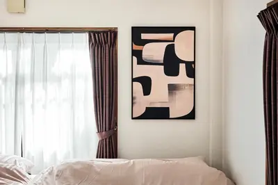 a bedroom with a bed and a window at \u3068\u307e\u308a\u30fc\u3068Stay \u5e61\u30f6\u8c37 \u6e0b\u8c37\u533a Tomareat Stay Hatagaya Shibuya City in Tokyo