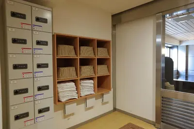 a room with a closet with some towels at KKR Hotel Nakameguro in Tokyo