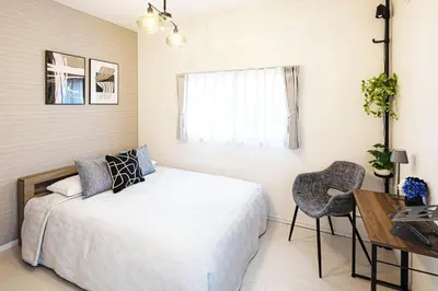 a bedroom with a bed and a desk and a chair at Disney nearby! 4bedroom family with airport access-Nobu in Tokyo