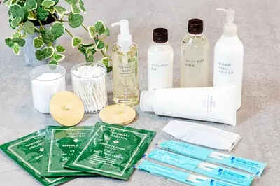 a table topped with bottles of soap and other items at Disney nearby! 4bedroom family with airport access-Nobu in Tokyo