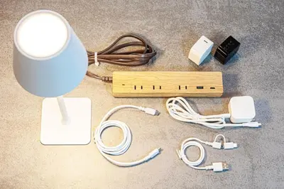 a table with a light and other electronic items on the floor at Disney nearby! 4bedroom family with airport access-Nobu in Tokyo