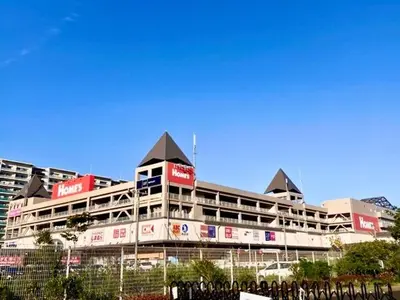 a large building with black roofs in a city at Disney nearby! 4bedroom family with airport access-Nobu in Tokyo