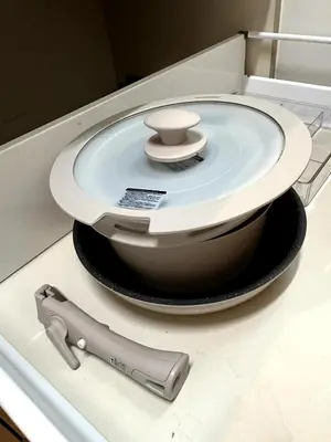 a toilet in a drawer with a remote control at Jtr\u5927\u548c\u753a1\u4e01\u76ee\u6238\u5efa in Tokyo