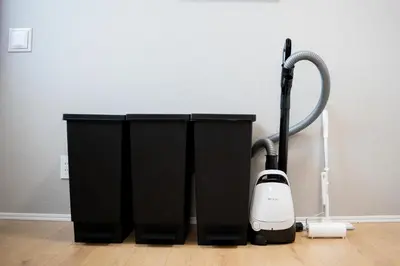 a vacuum cleaner sitting on the floor in a room at monthly prime shinjuku in Tokyo