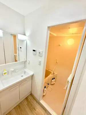 a bathroom with a sink and a mirror at Nippori mansion#Arakawa-ku in Tokyo