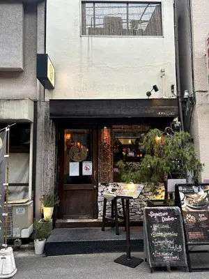 a restaurant with a table in front of a building at GInza6-7F in Tokyo