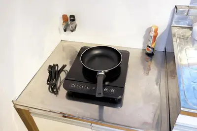 a pot sitting on top of a stove at Yoyogi New Flats - Vacation STAY 20254 in Tokyo