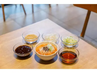 a table with four bowls of different types of food at Far East Village Hotel Tokyo Ariake - Vacation STAY 44125v in Tokyo