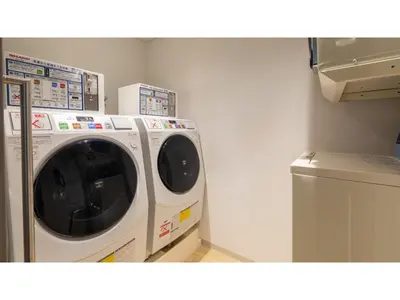 a washer and dryer in a laundry room at Far East Village Hotel Tokyo Ariake - Vacation STAY 44125v in Tokyo
