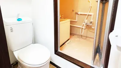 a small bathroom with a toilet and a shower at Espoir - Vacation STAY 42518v in Tokyo