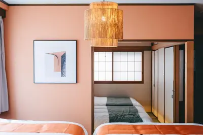 a bedroom with a bunk bed and a mirror at Otter Stay - Ikebukuro in Tokyo