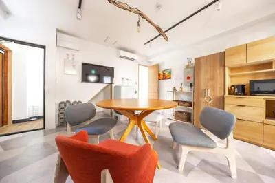 a kitchen and dining room with a table and chairs at The best Nakano house 4 minutes to station in Tokyo